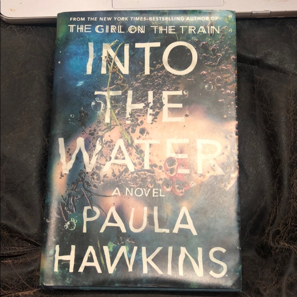 Into the Water by Paula Hawkins.